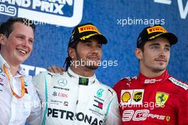 Race winner Lewis Hamilton (GBR) Mercedes AMG F1 on the podium with Charles Leclerc (MON) Ferrari. 29.09.2019. Formula 1 World Championship, Rd 16, Russian Grand Prix, Sochi Autodrom, Sochi, Russia, Race Day.