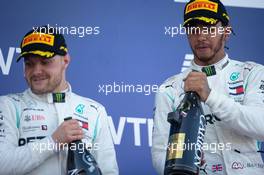 (L to R): Second placed Valtteri Bottas (FIN) Mercedes AMG F1 celebrates with race winner Lewis Hamilton (GBR) Mercedes AMG F1. 29.09.2019. Formula 1 World Championship, Rd 16, Russian Grand Prix, Sochi Autodrom, Sochi, Russia, Race Day.