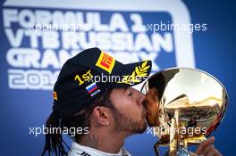 Race winner Lewis Hamilton (GBR) Mercedes AMG F1 celebrates on the podium. 29.09.2019. Formula 1 World Championship, Rd 16, Russian Grand Prix, Sochi Autodrom, Sochi, Russia, Race Day.