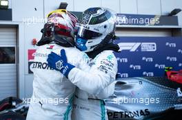 (L to R): Race winner Lewis Hamilton (GBR) Mercedes AMG F1 celebrates with Valtteri Bottas (FIN) Mercedes AMG F1 in parc ferme. 29.09.2019. Formula 1 World Championship, Rd 16, Russian Grand Prix, Sochi Autodrom, Sochi, Russia, Race Day.