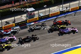 Sergio Perez (MEX) Racing Point F1 Team RP19, Nico Hulkenberg (GER) Renault F1 Team RS19, and Max Verstappen (NLD) Red Bull Racing RB15 at the start of the race. 29.09.2019. Formula 1 World Championship, Rd 16, Russian Grand Prix, Sochi Autodrom, Sochi, Russia, Race Day.