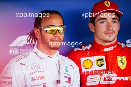 (L to R): Lewis Hamilton (GBR) Mercedes AMG F1 with pole sitter Charles Leclerc (MON) Ferrari in qualifying parc ferme. 28.09.2019. Formula 1 World Championship, Rd 16, Russian Grand Prix, Sochi Autodrom, Sochi, Russia, Qualifying Day.