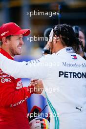 (L to R): Sebastian Vettel (GER) Ferrari with Lewis Hamilton (GBR) Mercedes AMG F1 in qualifying parc ferme. 28.09.2019. Formula 1 World Championship, Rd 16, Russian Grand Prix, Sochi Autodrom, Sochi, Russia, Qualifying Day.