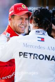 (L to R): Sebastian Vettel (GER) Ferrari with Lewis Hamilton (GBR) Mercedes AMG F1 in qualifying parc ferme. 28.09.2019. Formula 1 World Championship, Rd 16, Russian Grand Prix, Sochi Autodrom, Sochi, Russia, Qualifying Day.