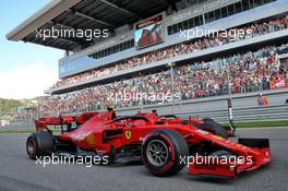 Charles Leclerc (MON) Ferrari SF90 and Sebastian Vettel (GER) Ferrari SF90 in qualifying parc ferme. 28.09.2019. Formula 1 World Championship, Rd 16, Russian Grand Prix, Sochi Autodrom, Sochi, Russia, Qualifying Day.