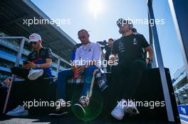 (L to R): Pierre Gasly (FRA) Scuderia Toro Rosso; Lewis Hamilton (GBR) Mercedes AMG F1; and Valtteri Bottas (FIN) Mercedes AMG F1, on the drivers parade. 29.09.2019. Formula 1 World Championship, Rd 16, Russian Grand Prix, Sochi Autodrom, Sochi, Russia, Race Day.