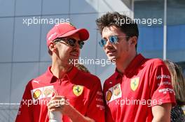 (L to R): Sebastian Vettel (GER) Ferrari with Charles Leclerc (MON) Ferrari on the drivers parade. 29.09.2019. Formula 1 World Championship, Rd 16, Russian Grand Prix, Sochi Autodrom, Sochi, Russia, Race Day.
