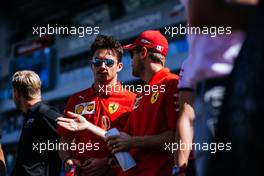 (L to R): Charles Leclerc (MON) Ferrari and Sebastian Vettel (GER) Ferrari on the drivers parade. 29.09.2019. Formula 1 World Championship, Rd 16, Russian Grand Prix, Sochi Autodrom, Sochi, Russia, Race Day.