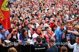 Lewis Hamilton (GBR) Mercedes AMG F1 signs autographs for the fans at the Fanzone. 26.09.2019. Formula 1 World Championship, Rd 16, Russian Grand Prix, Sochi Autodrom, Sochi, Russia, Preparation Day.