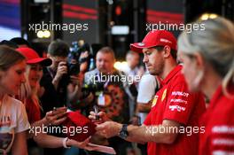 Sebastian Vettel (GER) Ferrari with fans at the Fanzone. 26.09.2019. Formula 1 World Championship, Rd 16, Russian Grand Prix, Sochi Autodrom, Sochi, Russia, Preparation Day.