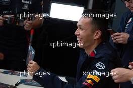 Alexander Albon (THA) Red Bull Racing signs autographs for the fans. 26.09.2019. Formula 1 World Championship, Rd 16, Russian Grand Prix, Sochi Autodrom, Sochi, Russia, Preparation Day.