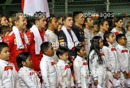 Drivers as the grid observes the national anthem. 22.09.2019. Formula 1 World Championship, Rd 15, Singapore Grand Prix, Marina Bay Street Circuit, Singapore, Race Day.