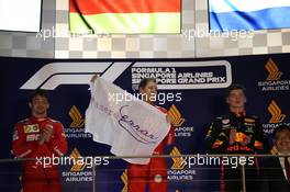 1st place Sebastian Vettel (GER) Ferrari SF90, 2nd place Charles Leclerc (MON) Ferrari SF90 and 3rd place Max Verstappen (NLD) Red Bull Racing RB15. 22.09.2019. Formula 1 World Championship, Rd 15, Singapore Grand Prix, Marina Bay Street Circuit, Singapore, Race Day.