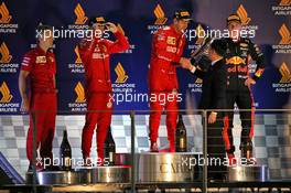 The podium (L to R): Inaki Rueda (ESP) Ferrari Race Strategist; Charles Leclerc (MON) Ferrari, second; Sebastian Vettel (GER) Ferrari, race winner; Max Verstappen (NLD) Red Bull Racing, third. 22.09.2019. Formula 1 World Championship, Rd 15, Singapore Grand Prix, Marina Bay Street Circuit, Singapore, Race Day.