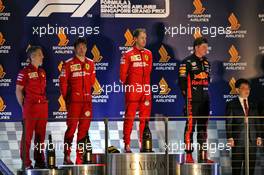 The podium (L to R): Inaki Rueda (ESP) Ferrari Race Strategist; Charles Leclerc (MON) Ferrari, second; Sebastian Vettel (GER) Ferrari, race winner; Max Verstappen (NLD) Red Bull Racing, third. 22.09.2019. Formula 1 World Championship, Rd 15, Singapore Grand Prix, Marina Bay Street Circuit, Singapore, Race Day.