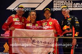 The podium (L to R): Charles Leclerc (MON) Ferrari; Inaki Rueda (ESP) Ferrari Race Strategist; Sebastian Vettel (GER) Ferrari; Max Verstappen (NLD) Red Bull Racing. 22.09.2019. Formula 1 World Championship, Rd 15, Singapore Grand Prix, Marina Bay Street Circuit, Singapore, Race Day.