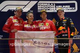 1st place Sebastian Vettel (GER) Ferrari SF90, 2nd place Charles Leclerc (MON) Ferrari SF90 and 3rd place Max Verstappen (NLD) Red Bull Racing RB15. 22.09.2019. Formula 1 World Championship, Rd 15, Singapore Grand Prix, Marina Bay Street Circuit, Singapore, Race Day.