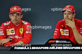 (L to R): Charles Leclerc (MON) Ferrari and Sebastian Vettel (GER) Ferrari in the post race FIA Press Conference. 22.09.2019. Formula 1 World Championship, Rd 15, Singapore Grand Prix, Marina Bay Street Circuit, Singapore, Race Day.