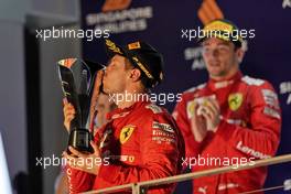 Race winner Sebastian Vettel (GER) Ferrari celebrates on the podium. 22.09.2019. Formula 1 World Championship, Rd 15, Singapore Grand Prix, Marina Bay Street Circuit, Singapore, Race Day.