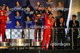 The podium (L to R): Charles Leclerc (MON) Ferrari, second; Sebastian Vettel (GER) Ferrari, race winner; Max Verstappen (NLD) Red Bull Racing, third. 22.09.2019. Formula 1 World Championship, Rd 15, Singapore Grand Prix, Marina Bay Street Circuit, Singapore, Race Day.