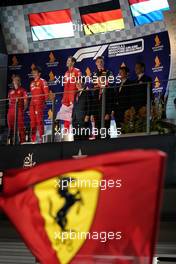 The podium (L to R): Inaki Rueda (ESP) Ferrari Race Strategist; Charles Leclerc (MON) Ferrari, second; Sebastian Vettel (GER) Ferrari, race winner; Max Verstappen (NLD) Red Bull Racing, third. 22.09.2019. Formula 1 World Championship, Rd 15, Singapore Grand Prix, Marina Bay Street Circuit, Singapore, Race Day.