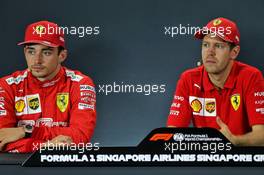 (L to R): Charles Leclerc (MON) Ferrari and Sebastian Vettel (GER) Ferrari in the post race FIA Press Conference. 22.09.2019. Formula 1 World Championship, Rd 15, Singapore Grand Prix, Marina Bay Street Circuit, Singapore, Race Day.