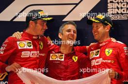 The podium (L to R): Charles Leclerc (MON) Ferrari; Inaki Rueda (ESP) Ferrari Race Strategist; Sebastian Vettel (GER) Ferrari. 22.09.2019. Formula 1 World Championship, Rd 15, Singapore Grand Prix, Marina Bay Street Circuit, Singapore, Race Day.