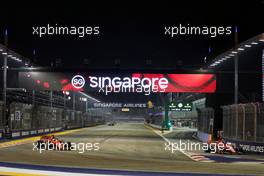 Sebastian Vettel (GER) Ferrari SF90 passes team mate Charles Leclerc (MON) Ferrari SF90 as he exits from his pit stop. 22.09.2019. Formula 1 World Championship, Rd 15, Singapore Grand Prix, Marina Bay Street Circuit, Singapore, Race Day.