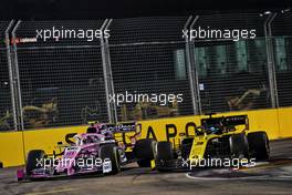 Lance Stroll (CDN) Racing Point F1 Team RP19 and Daniel Ricciardo (AUS) Renault F1 Team RS19 battle for position. 22.09.2019. Formula 1 World Championship, Rd 15, Singapore Grand Prix, Marina Bay Street Circuit, Singapore, Race Day.