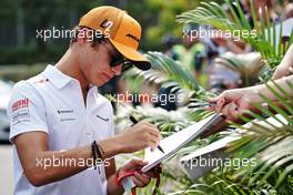 Lando Norris (GBR) McLaren signs autographs for the fans. 21.09.2019. Formula 1 World Championship, Rd 15, Singapore Grand Prix, Marina Bay Street Circuit, Singapore, Qualifying Day.