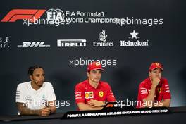 The post qualifying FIA Press Conference (L to R): Lewis Hamilton (GBR) Mercedes AMG F1, second; Charles Leclerc (MON) Ferrari, pole position; Sebastian Vettel (GER) Ferrari, third. 21.09.2019. Formula 1 World Championship, Rd 15, Singapore Grand Prix, Marina Bay Street Circuit, Singapore, Qualifying Day.