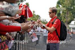 Sebastian Vettel (GER) Ferrari signs autographs for the fans. 21.09.2019. Formula 1 World Championship, Rd 15, Singapore Grand Prix, Marina Bay Street Circuit, Singapore, Qualifying Day.