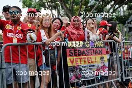 Circuit atmosphere - Race fans and banner for Sebastian Vettel (GER) Ferrari. 21.09.2019. Formula 1 World Championship, Rd 15, Singapore Grand Prix, Marina Bay Street Circuit, Singapore, Qualifying Day.