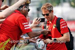 Sebastian Vettel (GER) Ferrari signs autographs for the fans. 21.09.2019. Formula 1 World Championship, Rd 15, Singapore Grand Prix, Marina Bay Street Circuit, Singapore, Qualifying Day.
