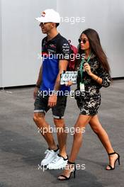 Pierre Gasly (FRA) Scuderia Toro Rosso with his girlfriend Caterina Masetti Zannini (ITA). 22.09.2019. Formula 1 World Championship, Rd 15, Singapore Grand Prix, Marina Bay Street Circuit, Singapore, Race Day.