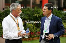 (L to R): Chase Carey (USA) Formula One Group Chairman with John Waldron (USA) President and COO of Goldman Sachs. 22.09.2019. Formula 1 World Championship, Rd 15, Singapore Grand Prix, Marina Bay Street Circuit, Singapore, Race Day.