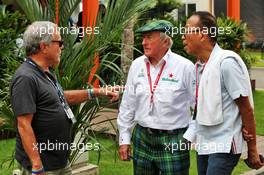 (L to R): Sir Martin Sorrell (GBR) with Jackie Stewart (GBR) and Colin Syn (SIN) Singapore GP Promotor. 22.09.2019. Formula 1 World Championship, Rd 15, Singapore Grand Prix, Marina Bay Street Circuit, Singapore, Race Day.