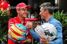 (L to R): Sebastian Vettel (GER) Ferrari with Loic Duval (FRA). 19.09.2019. Formula 1 World Championship, Rd 15, Singapore Grand Prix, Marina Bay Street Circuit, Singapore, Preparation Day.
