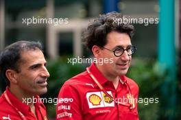 Mattia Binotto (ITA) Ferrari Team Principal with Marc Gene (ESP) Ferrari Test Driver. 19.09.2019. Formula 1 World Championship, Rd 15, Singapore Grand Prix, Marina Bay Street Circuit, Singapore, Preparation Day.