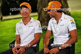 (L to R): Lando Norris (GBR) McLaren with Carlos Sainz Jr (ESP) McLaren. 19.09.2019. Formula 1 World Championship, Rd 15, Singapore Grand Prix, Marina Bay Street Circuit, Singapore, Preparation Day.