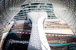 Lewis Hamilton (GBR) Mercedes AMG F1 W10 and Antonio Giovinazzi (ITA) Alfa Romeo Racing C38. 29.11.2019. Formula 1 World Championship, Rd 21, Abu Dhabi Grand Prix, Yas Marina Circuit, Abu Dhabi, Practice Day.