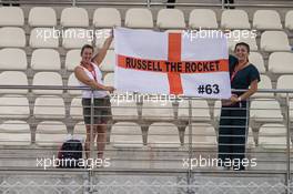 Circuit atmosphere - fans in the grandstand and a flag for George Russell (GBR) Williams Racing. 29.11.2019. Formula 1 World Championship, Rd 21, Abu Dhabi Grand Prix, Yas Marina Circuit, Abu Dhabi, Practice Day.