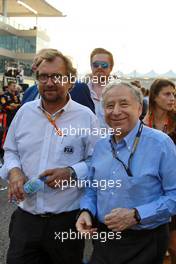 (L to R): Olivier Fisch (FRA) FIA Director of Communications with Jean Todt (FRA) FIA President on the grid. 01.12.2019. Formula 1 World Championship, Rd 21, Abu Dhabi Grand Prix, Yas Marina Circuit, Abu Dhabi, Race Day.