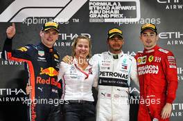 The podium (L to R): Max Verstappen (NLD) Red Bull Racing, second; Britta Seeger, Member of the Board of Management for Mercedes-Benz Cars Marketing and Sales; Lewis Hamilton (GBR) Mercedes AMG F1, race winner; Charles Leclerc (MON) Ferrari, third. 01.12.2019. Formula 1 World Championship, Rd 21, Abu Dhabi Grand Prix, Yas Marina Circuit, Abu Dhabi, Race Day.