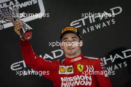 Charles Leclerc (MON) Ferrari celebrates his third position on the podium. 01.12.2019. Formula 1 World Championship, Rd 21, Abu Dhabi Grand Prix, Yas Marina Circuit, Abu Dhabi, Race Day.