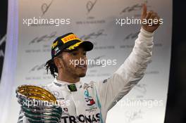 Race winner Lewis Hamilton (GBR) Mercedes AMG F1 celebrates on the podium. 01.12.2019. Formula 1 World Championship, Rd 21, Abu Dhabi Grand Prix, Yas Marina Circuit, Abu Dhabi, Race Day.