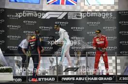 1st place Lewis Hamilton (GBR) Mercedes AMG F1 W10, 2nd Max Verstappen (NLD) Red Bull Racing RB15 and 3rd place Charles Leclerc (MON) Ferrari SF90. 01.12.2019. Formula 1 World Championship, Rd 21, Abu Dhabi Grand Prix, Yas Marina Circuit, Abu Dhabi, Race Day.