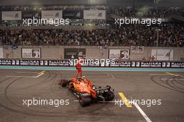 Charles Leclerc (MON) Ferrari SF90 celebrates his third position at the end of the race. 01.12.2019. Formula 1 World Championship, Rd 21, Abu Dhabi Grand Prix, Yas Marina Circuit, Abu Dhabi, Race Day.