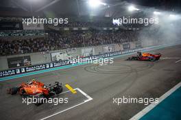 Charles Leclerc (MON) Ferrari SF90 and Max Verstappen (NLD) Red Bull Racing RB15 celebrate at the end of the race. 01.12.2019. Formula 1 World Championship, Rd 21, Abu Dhabi Grand Prix, Yas Marina Circuit, Abu Dhabi, Race Day.