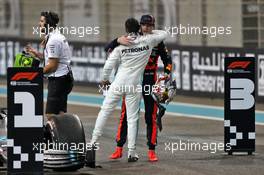 Race winner Lewis Hamilton (GBR) Mercedes AMG F1 celebrates in parc ferme with second placed Max Verstappen (NLD) Red Bull Racing. 01.12.2019. Formula 1 World Championship, Rd 21, Abu Dhabi Grand Prix, Yas Marina Circuit, Abu Dhabi, Race Day.